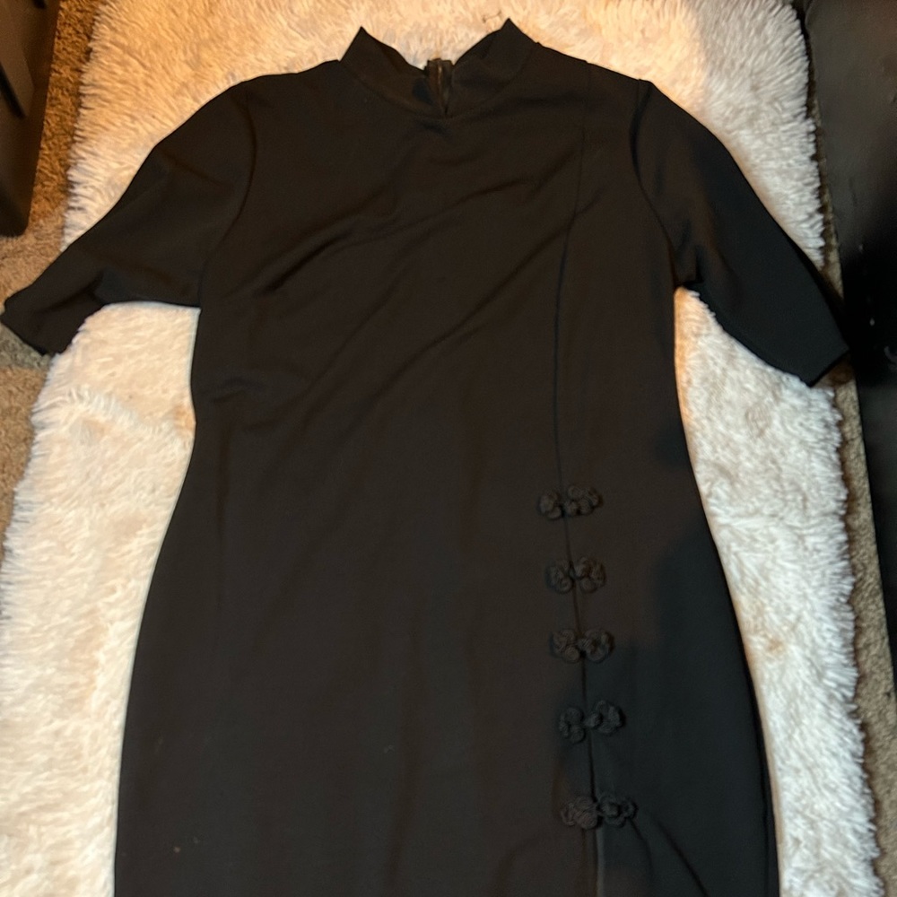 Black dress with slit and bows on thigh